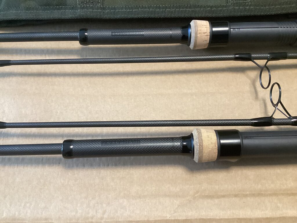 A PAIR OF BRAND NEW SONIK INSURGENT CORK EXTRACTABLE RODS AND